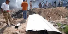 Le immagini del disastro aereo in India