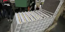 Fabbrica clandestina di sigarette a Parma, 12 arresti