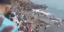 In migliaia invadono l'enclave spagnola di Ceuta. Video choc, bufera su Sanchez