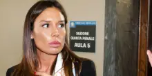 Nuova autodifesa di Minetti: &ldquo;La grazia? Tutto regolare. Indebita esposizione mediatica di un minore&rdquo;. Intanto Procura e Interpol verificano