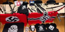 Vessilli neonazisti e suprematisti, armi bianche e manuali per la fabbricazione di ordigni artigianali: arrestato 17enne a Trento