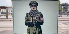 Milano,  compare un murale che raffigura Hitler con la kefiah