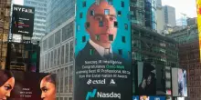 Acea, due premi per la finanza: a Dario Michi gli Extel Awards. E il suo volto finisce a Times Square