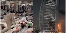 Dubai, dalle camere extra lusso ai materassi per terra nei parcheggi: la notte di terrore dei turisti. &laquo;State lontano da mare e piscine&raquo;