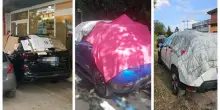 Grandine, auto distrutte: scatta l'effetto Mac Gyver, vetture protette con ogni strumento disponibile FOTO