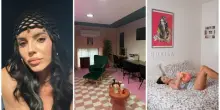 Shaila Gatta, la casa a Milano: la zona living essenziale, la parete con il tapiro di Striscia, la lampada fatta a mano dall'ex, lo studio colorato