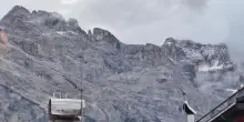 Il freddo in montagna, cime attorno Cortina imbiancate di neve