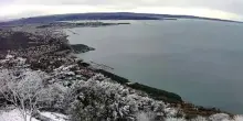 Primi fiocchi di neve a Trieste con bora e termometro in discesa