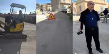 Buche in strada rattoppate dal parroco, Comune avvia lavori