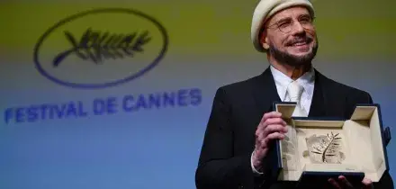 John Travolta a sorpresa Palma d'onore, in una giornata di icone e divi