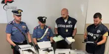 Un arsenale di armi e 16 chili di droga sotterrati nei boschi, due arresti