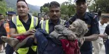 LA STORIA | L'ultranovantenne estratta dal fango, la foto simbolo della tragedia