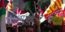 "Sciopero Generale a Roma: Manifestanti in Piazza con Bandiere Palestinesi e Slogan Contro i Governi"