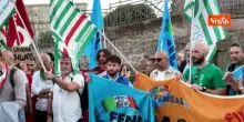 Minuto di silenzio alla fiaccolata per Andrea Moretti, l'operaio morto al Colosseo
