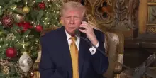 Trump scherza con un bambino: non far&ograve; infiltrare un Babbo Natale cattivo
