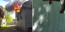 Usa, madre intrappolata nell&rsquo;incendio lancia il neonato dalla finestra: l'agente lo afferra al volo