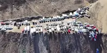 Cile, frane e alluvioni devastano il Nord: veicoli sospesi sul baratro a Iquique