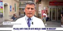 Bambini in auto, sicuri in braccio?