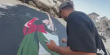 Sui muri di Gaza appare un murales sul rapper Macklemore