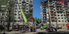 Ucraina, attacco russo su Kiev: soccorritori al lavoro tra le macerie