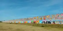 ?Santa Maria Capua Vetere, ecco il murale da Guinness dei primati sull'esterno del carcere