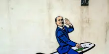 Un murale a Malpensa, 'welcome to Silvio Berlusconi airport'
