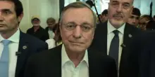 Draghi al Meeting, applausi e visita a mostra su lavoro